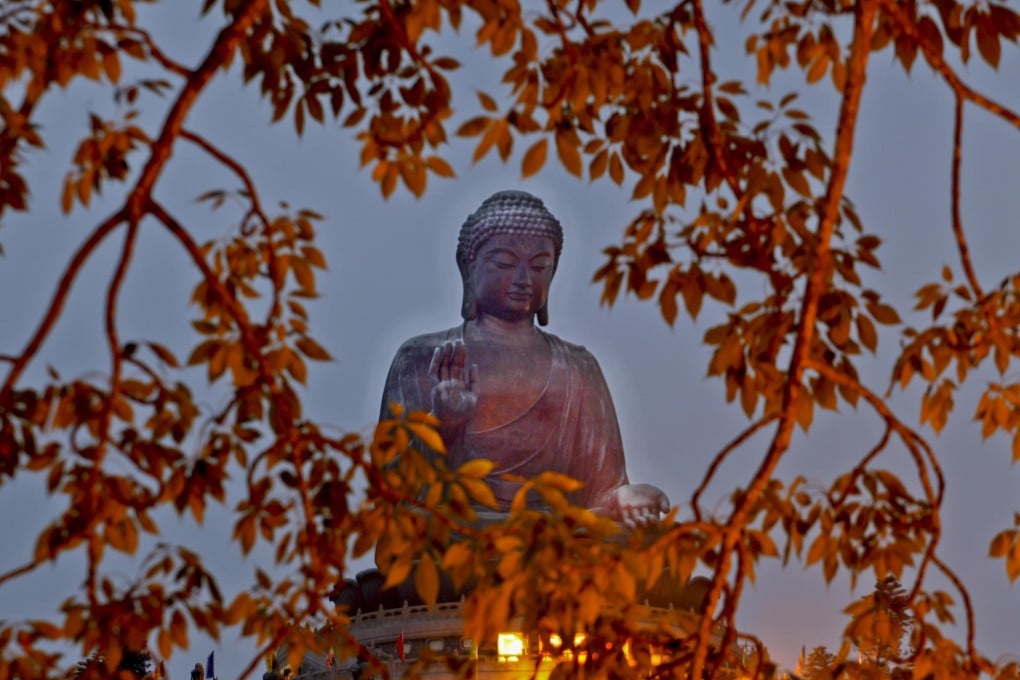 The Tian Tan Buddha at the Po Lin Monastery on Lantau, when built the world's largest seated outdoor Buddha, was unveiled 20 years ago. Photo: Felix Wong