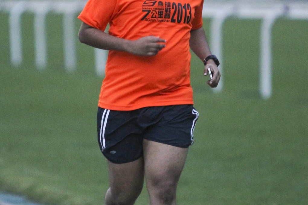Chatterjee trains for the half-marathon event at the 2014 Standard Chartered Hong Kong Marathon. Photo: K.Y Cheng