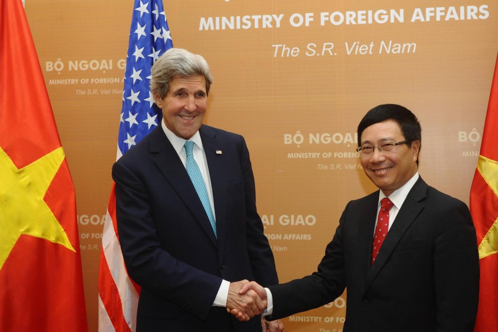John Kerry with Vietnam's Pham Binh Minh. Photo: Reuters