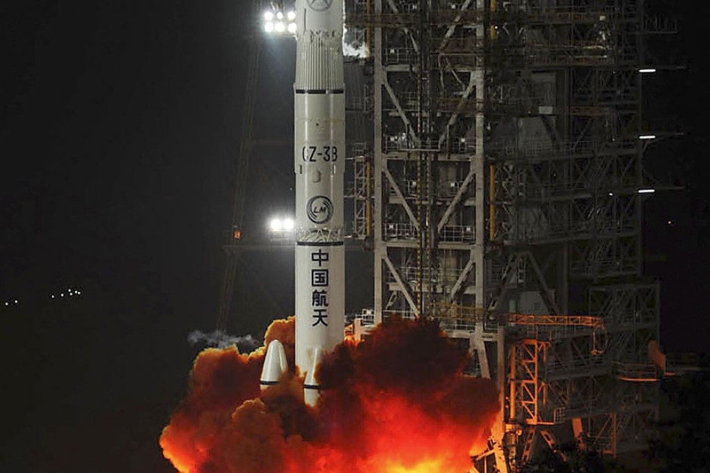 The rocket carrying the lunar probe blasts off. Photo: AP