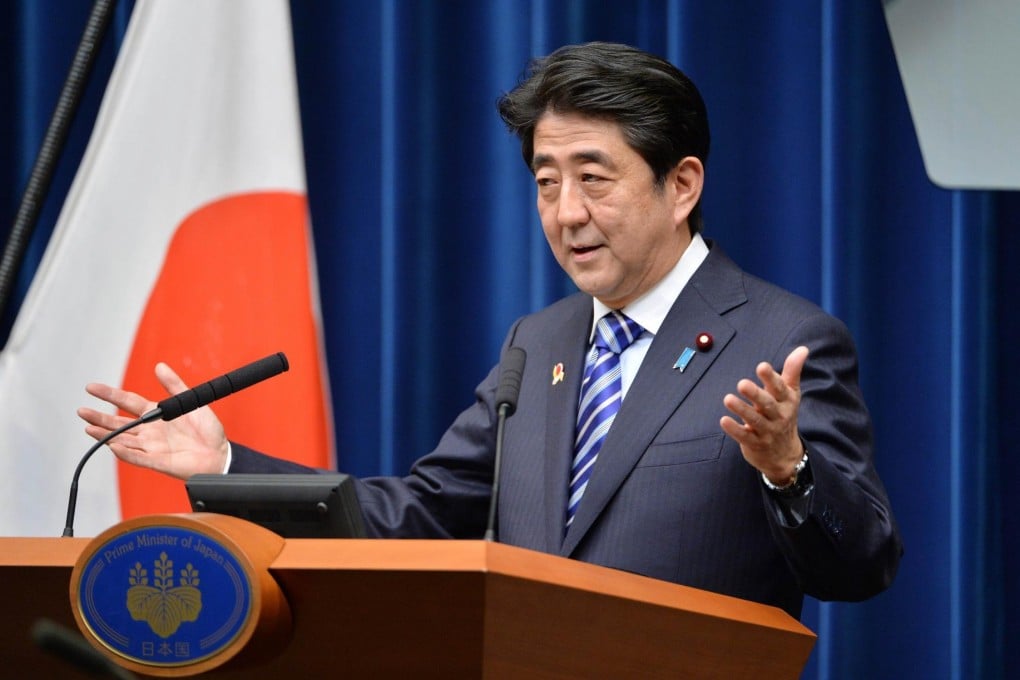 Japanese Prime Minister Shinzo Abe has targeted real growth of 2 per cent per year, more than double the rate the country has seen in recent decades. Photo: AFP