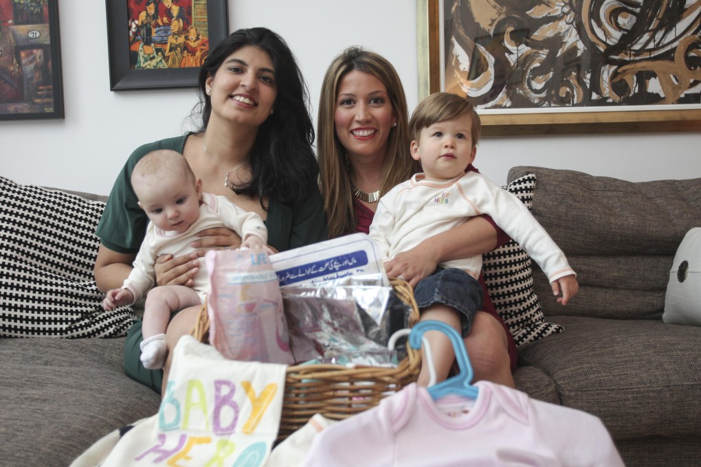 Samar Shaheryar (left), with baby Isha, and Alicia Wieser, with son Cooper Elliott. Photo: Paul Yeung