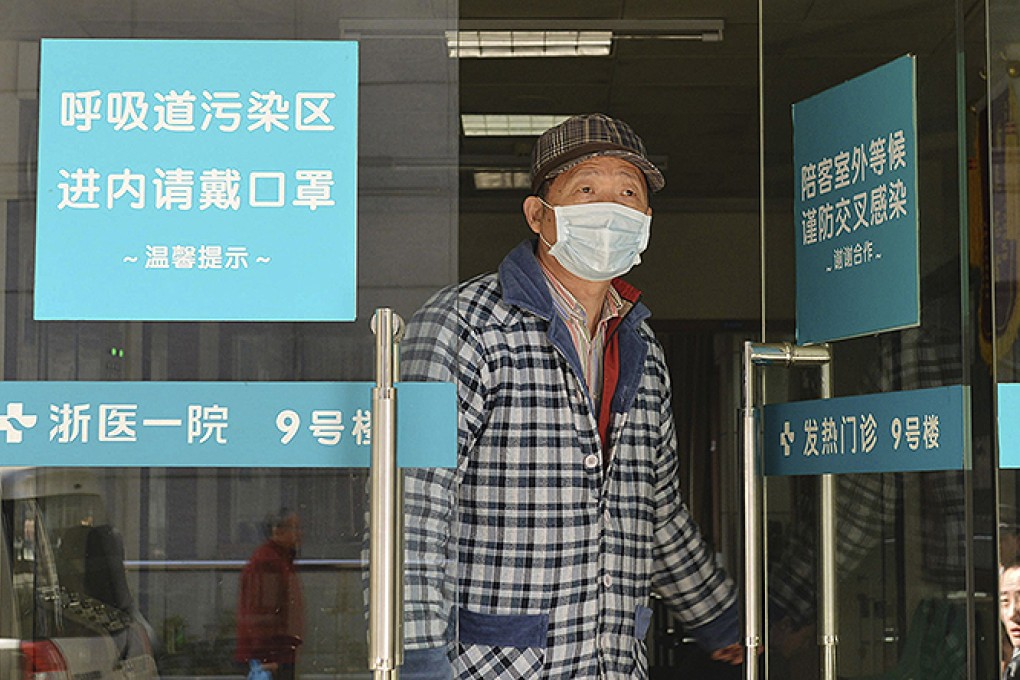 A man walks out of the fever clinic of the First Affiliated Hospital of College of Medicine of Zhejiang University in Hangzhou, Zhejiang province. Photo: Xinhua