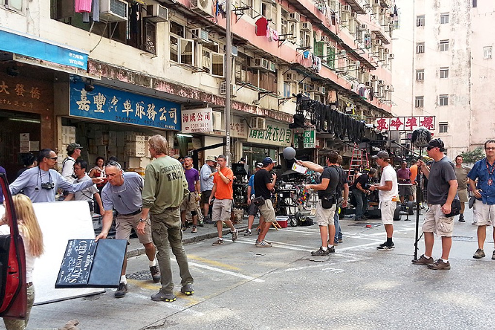 Police have arrested a second man accused of trying to extort money from the Transformers film crew during shooting in To Kwa Wan. Photo: Emily Tsang Oi-ying