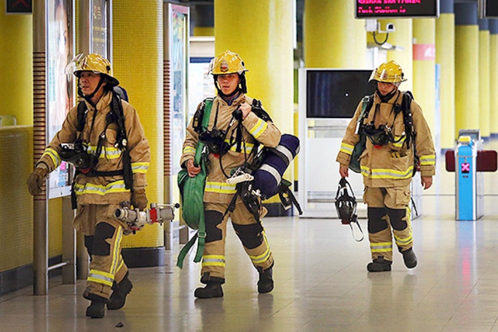 Firefighters at Yau Tong Station. Photo: Cheung Chi-fai