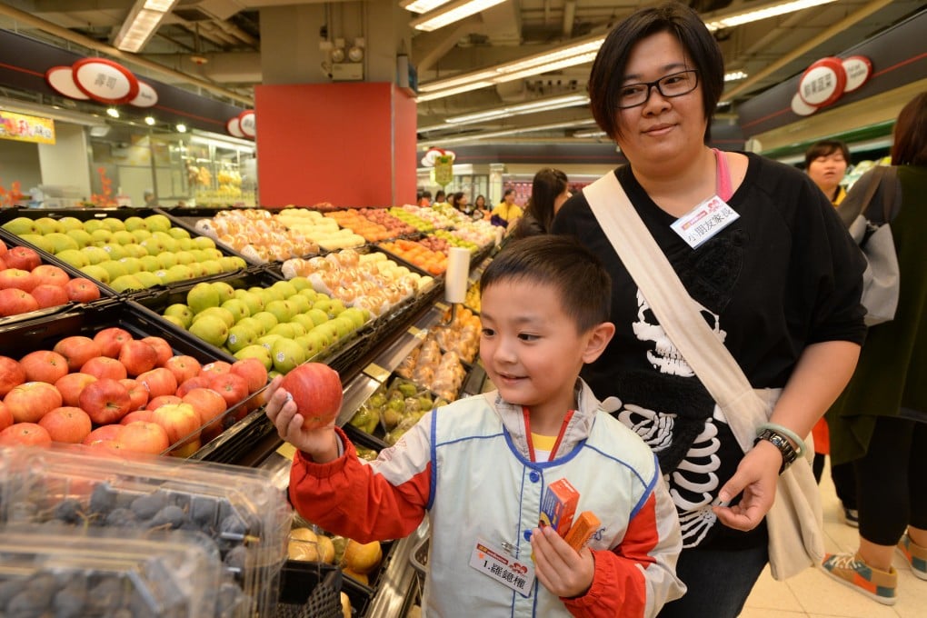 Five-year-old Law Yee-kuen and his mother join the social adaptation programme at Wellcome in Tseung Kwan O. Photo: SCMP