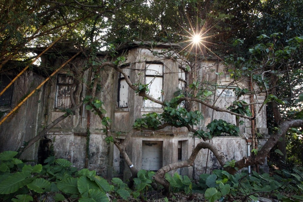 Abandoned for 30 years, the Old Dairy Farm Senior Staff Quarters on Pok Fu Lam Road. The site in Pok Fu Lam village was once the city's biggest dairy farm. Photo: Nora Tam