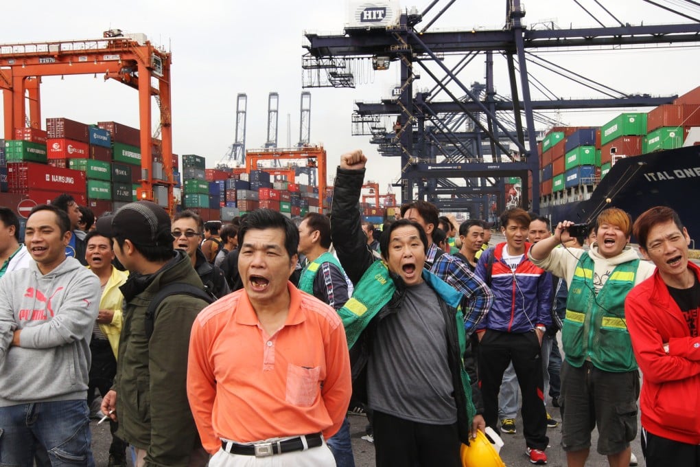 Disgruntled workers strike at the Kwai Chung container terminal in a dispute over pay. Photo: Edward Wong