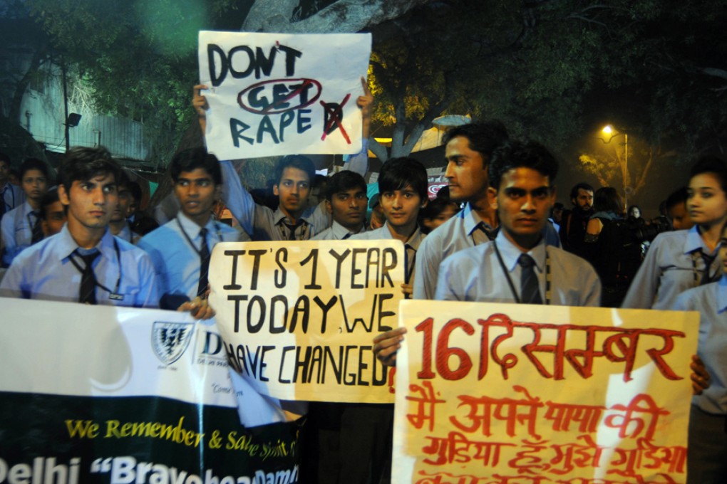 Indian school children hold placards to commemorate last year's gang rape and murder of a young woman in New Delhi. Photo: Xinhua
