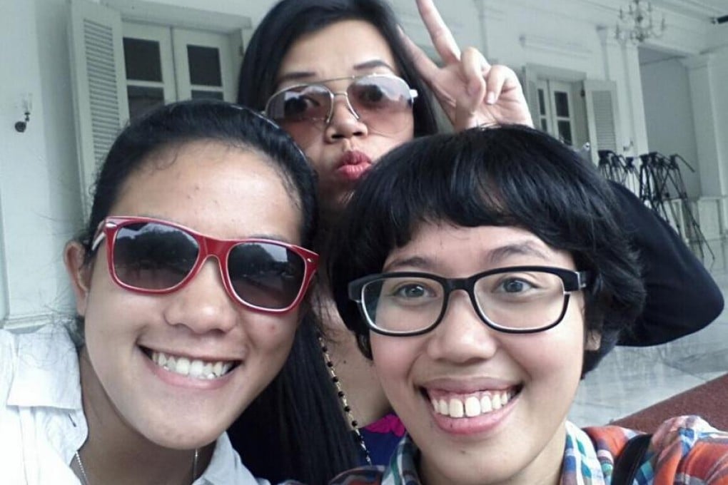Mita Diran, right, poses with friends.