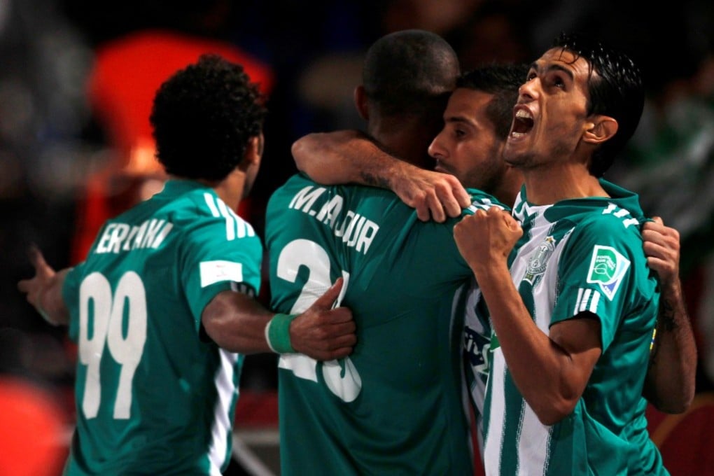 Raja Casablanca players celebrate Mouhssine Iajour's goal against Atletico Mineiro during their Club World Cup semi-final in Marrakech. Photos: Reuters