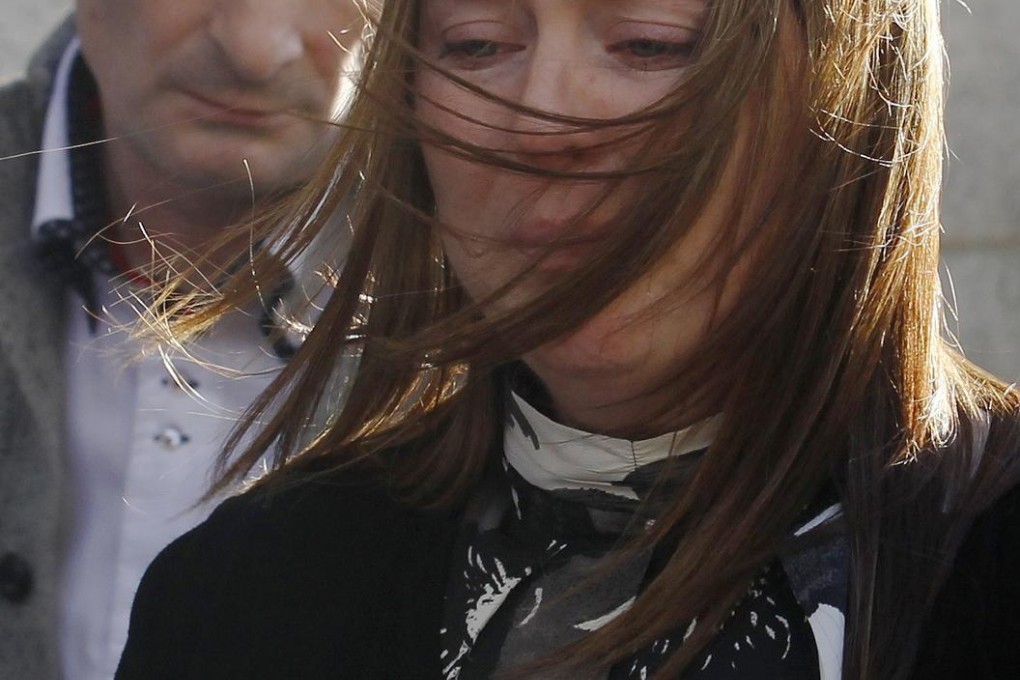 Rebecca Rigby listens as police read out the family's statement.