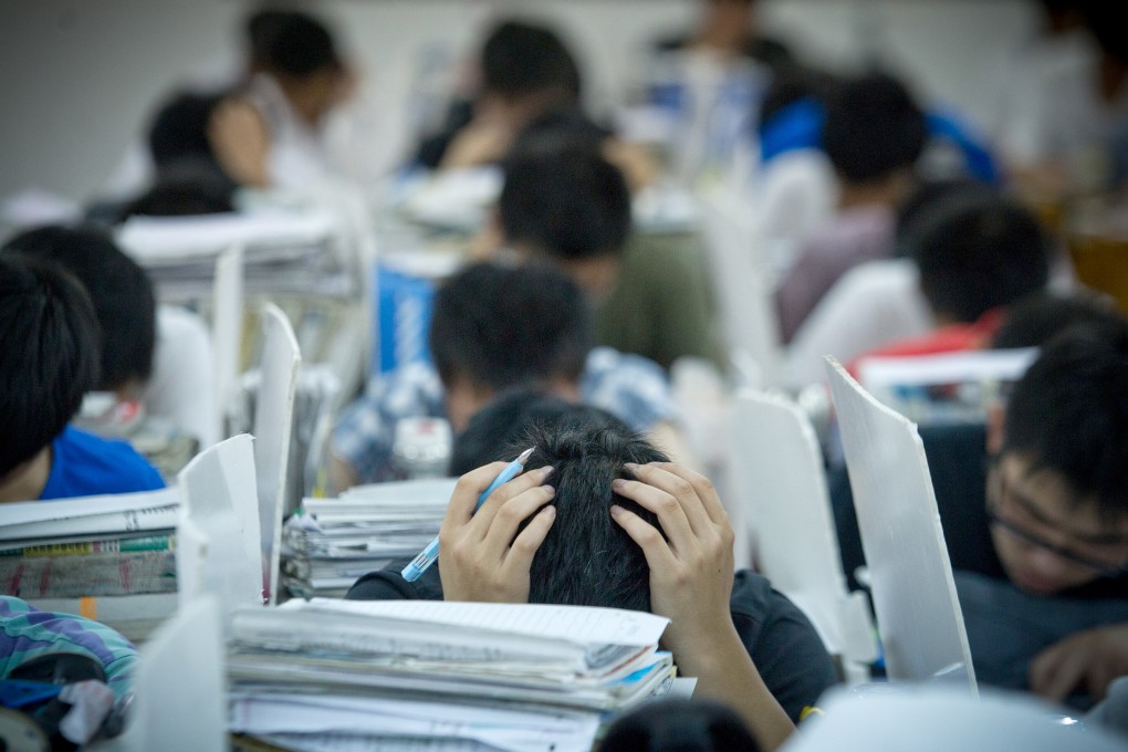 Students sit an entrance exam in China. For the country's disabled, it can be a struggle to be given the chance to take the exam. Photo: Xinhua