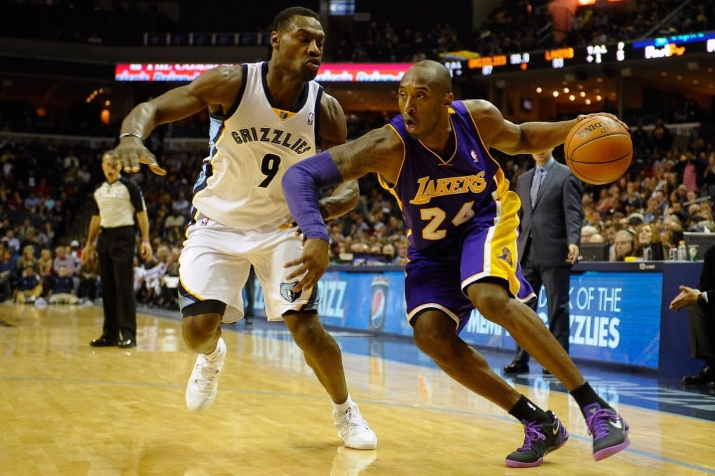 Lakers guard Kobe Bryant drives against Tony Allen during Tuesday's Memphis Grizzlies game in which he fractured his left knee. Photo: USA Today