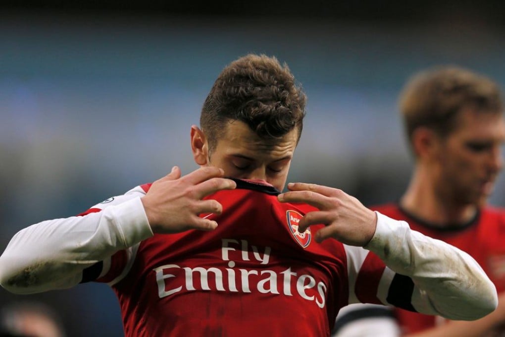 Jack Wilshere reacts after Arsenal lose 6-3 to English Premier League rivals Manchester City. Photo: Reuters