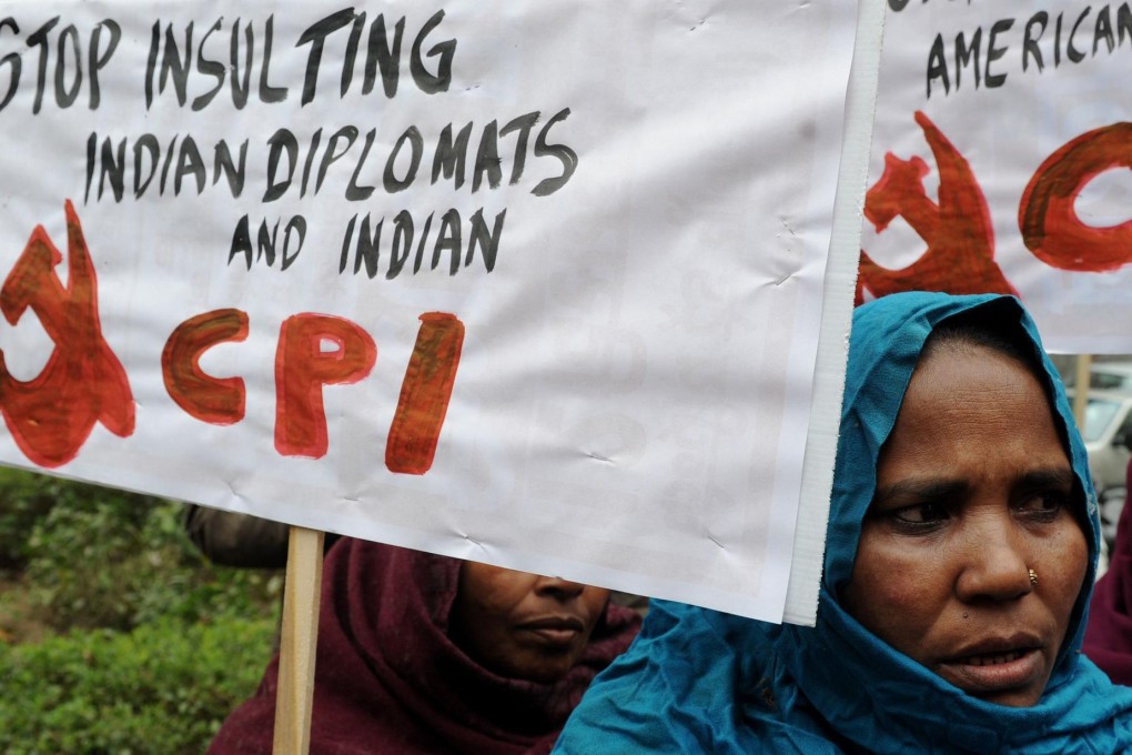 Communist Party of India (Marxist) activists hold placards during a protest near the American Centre in New Delhi yesterday. Photo: AFP