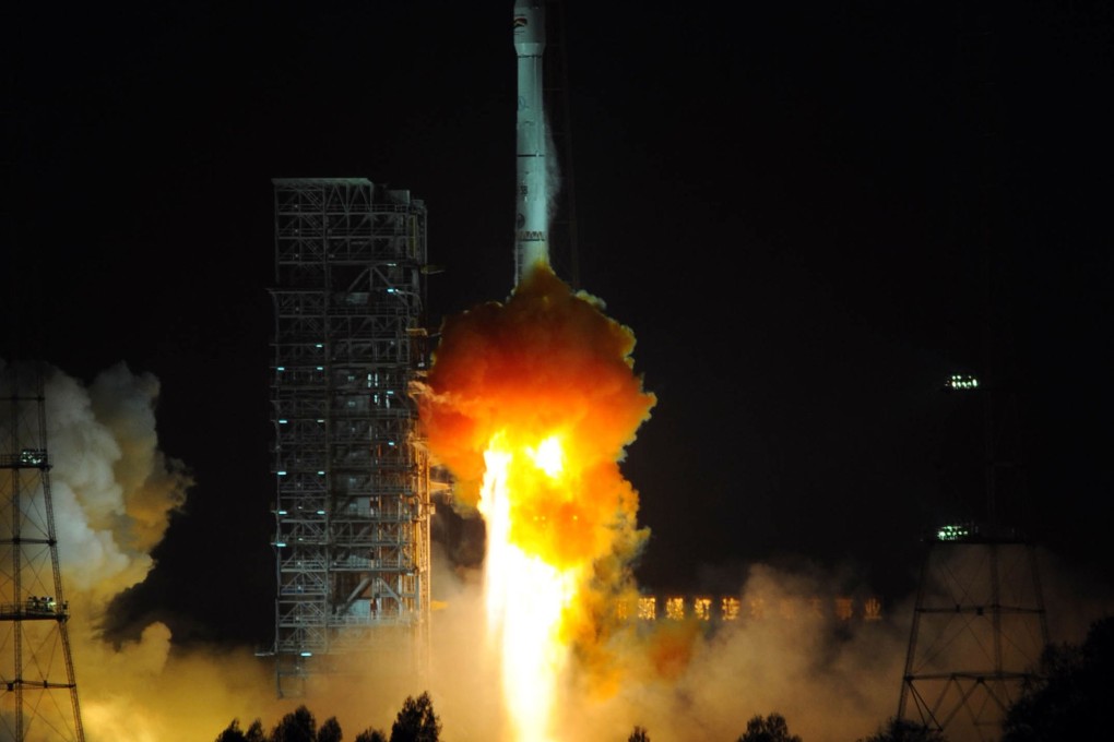 A Chinese Long March-3B carrier rocket blasts off with Bolivia's first telecommunications satellite on Saturday. Photo: AFP