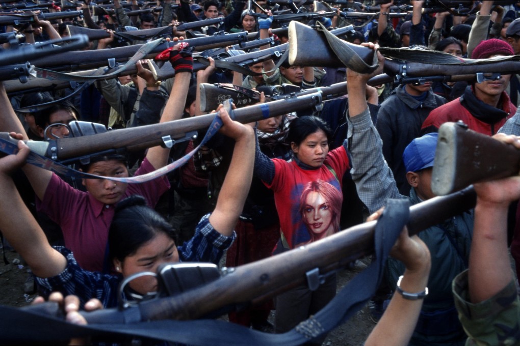 Maoist rebels show arms in Nepal. Photo: Tomas van Houtryve