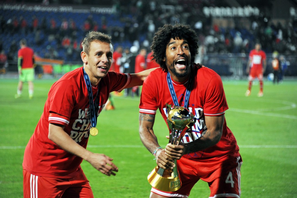 Bayern Munich's Brazilian players Rafinha (left) and Dante celebrate their victory over Raja Casablanca in the Club World Cup final. Photo: EPA