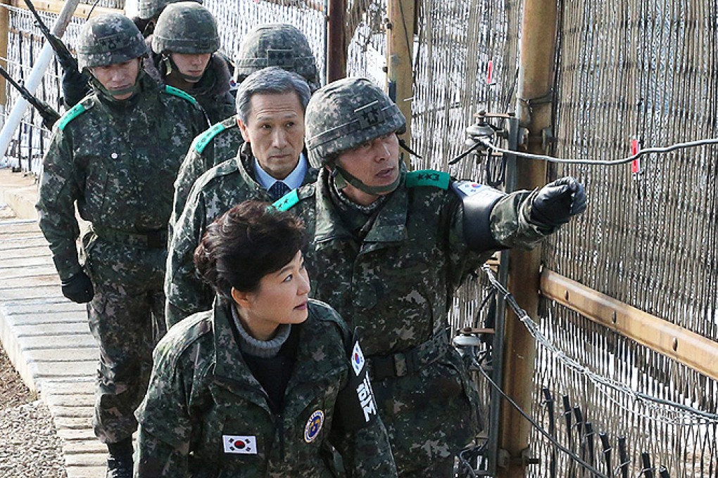 South Korean President Park Geun-hye (front) visits frontline troops at the Demilitarized Zone in Yanggu, South Korea, on Tuesday. Photo: AP