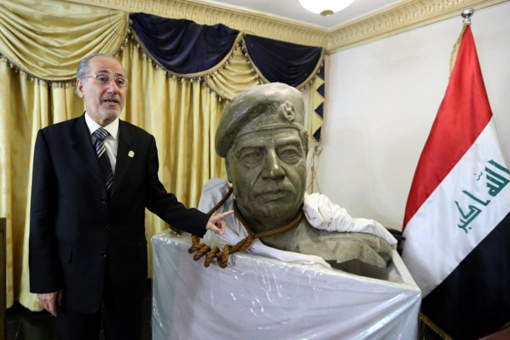 The bust of Saddam Hussein and the rope used to hang him in the living room of ex-national security adviser Mowaffak al-Rubaie. Photo: AFP