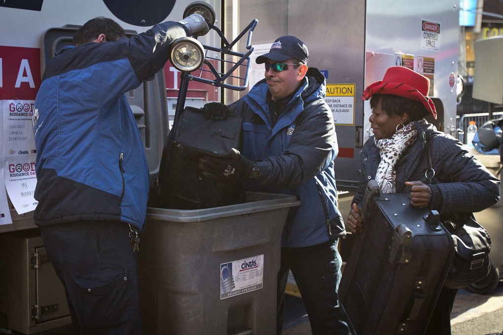 Workers dump a cart full of one woman's regrets. Photo: Reuters