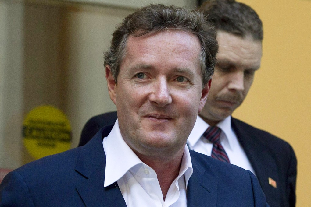 Piers Morgan was hit on the body four times in the over he faced against former Australian speedster Brett Lee. Photo: AP