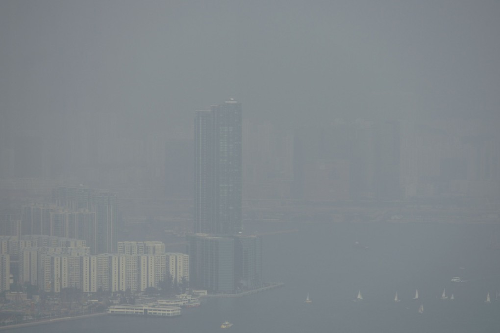 Sailing boats cruised Victoria Harbour yesterday. Photo: AFP