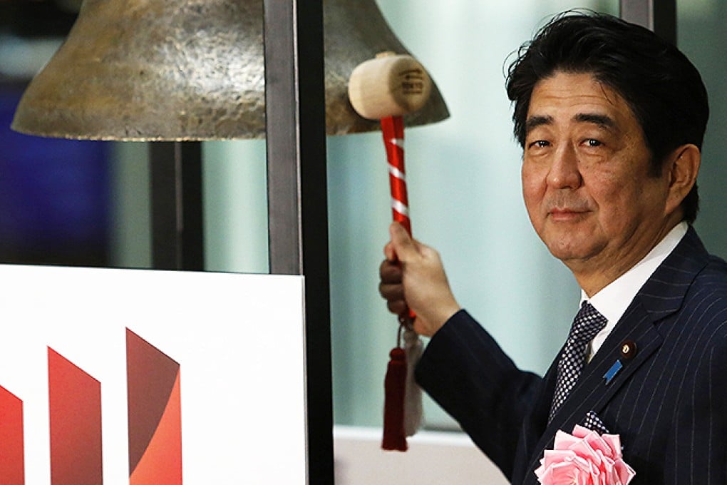 Shinzo Abe at Tokyo stock exchange yesterday. Photo: Reuters
