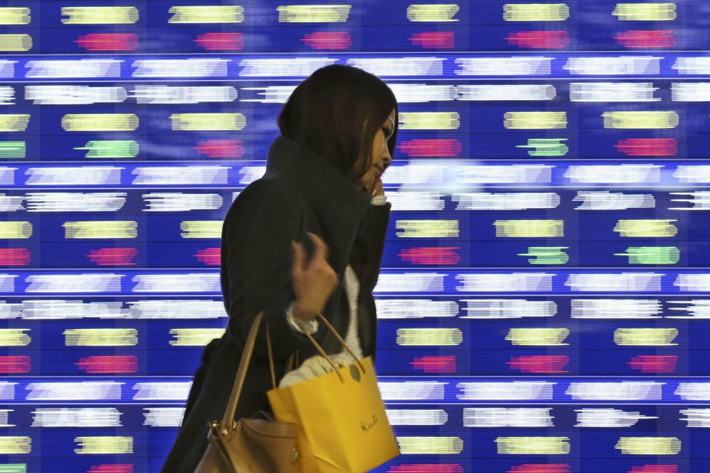 The Nikkei has gained more than 56 per cent so far this year, and many seem to think it will be another boom next year. Photo: AP