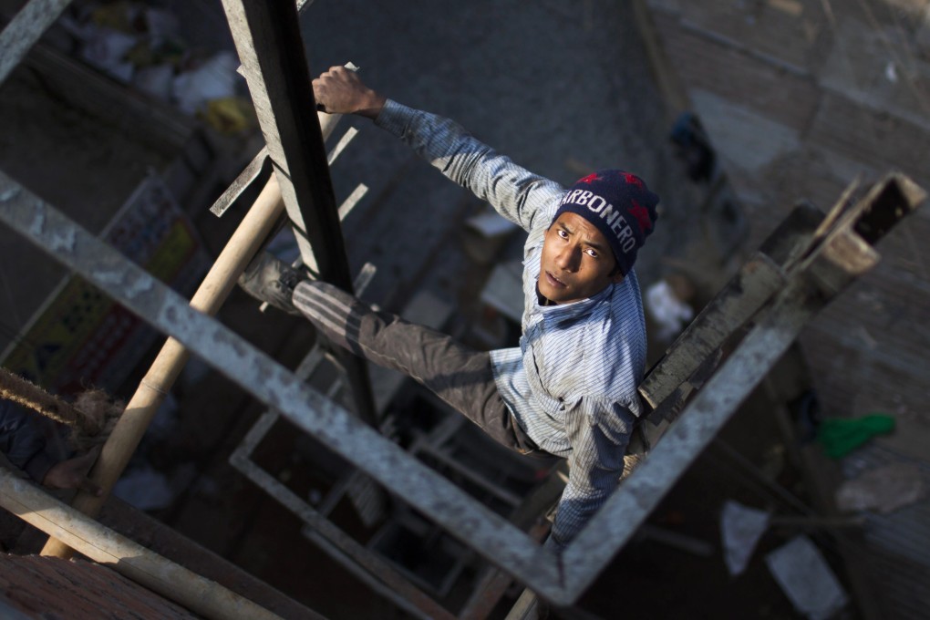 Despite the stories of suffering faced by Nepali migrant workers, many are returning to jobs they have held for years. Photo: EPA