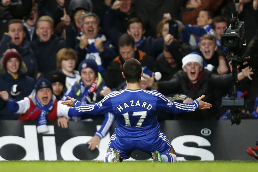Eden Hazard celebrates scoring the equaliser against Liverpool. Photo: Xinhua