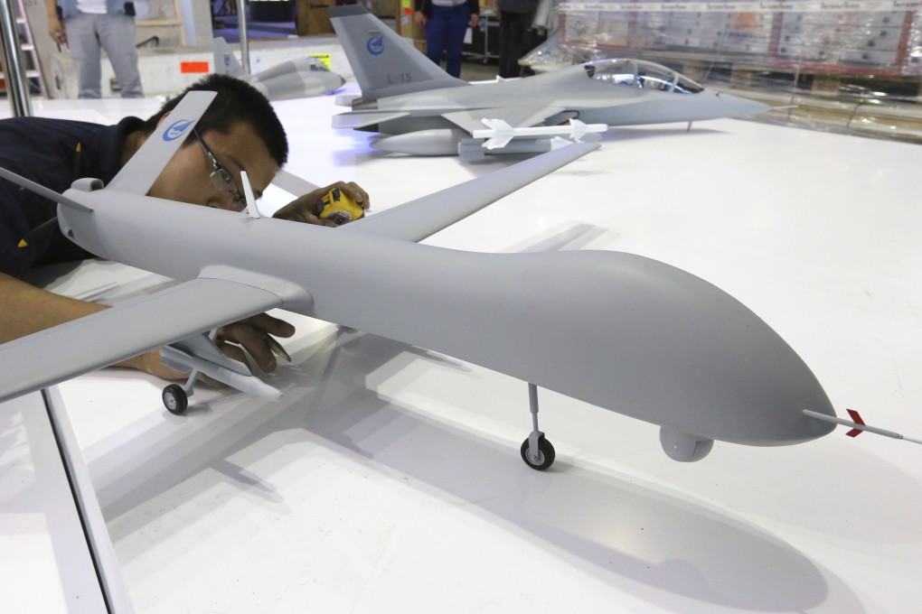 A drone model pictured at an exhibit. Beijing police have arrested four police after a drone forced civilian planes to be diverted. Photo: Reuters