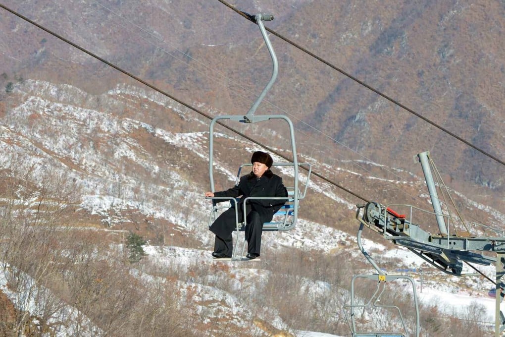 Kim Jong-un inspects the newly opened Masik Pass ski resort, which he described as 'impeccable', from his ski lift. Photo: EPA