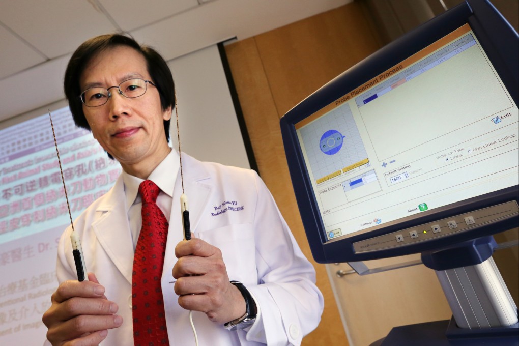 Dr Simon Yu Chun-ho, professor at the Department of Imaging and Interventional Radiology of Chinese University of Hong Kong, attends a press conference on Asia's first clinical use of Percutaneous NanoKnife in Hong Kong on Dec. 30, 2013. Photo: SCMP/David Wong