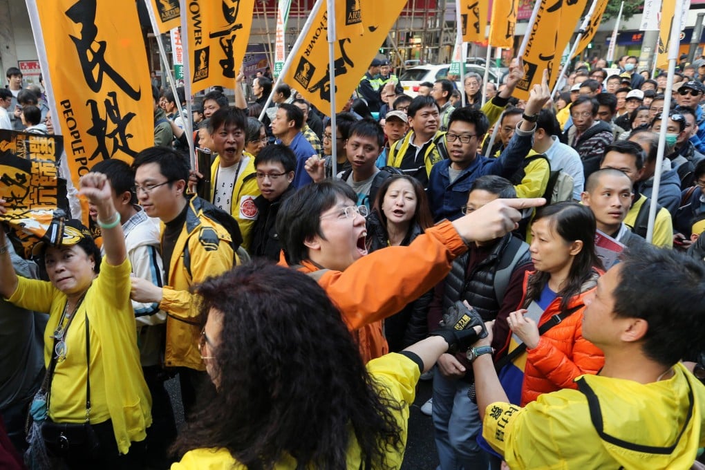 Protesters make their views known. Photo: David Wong