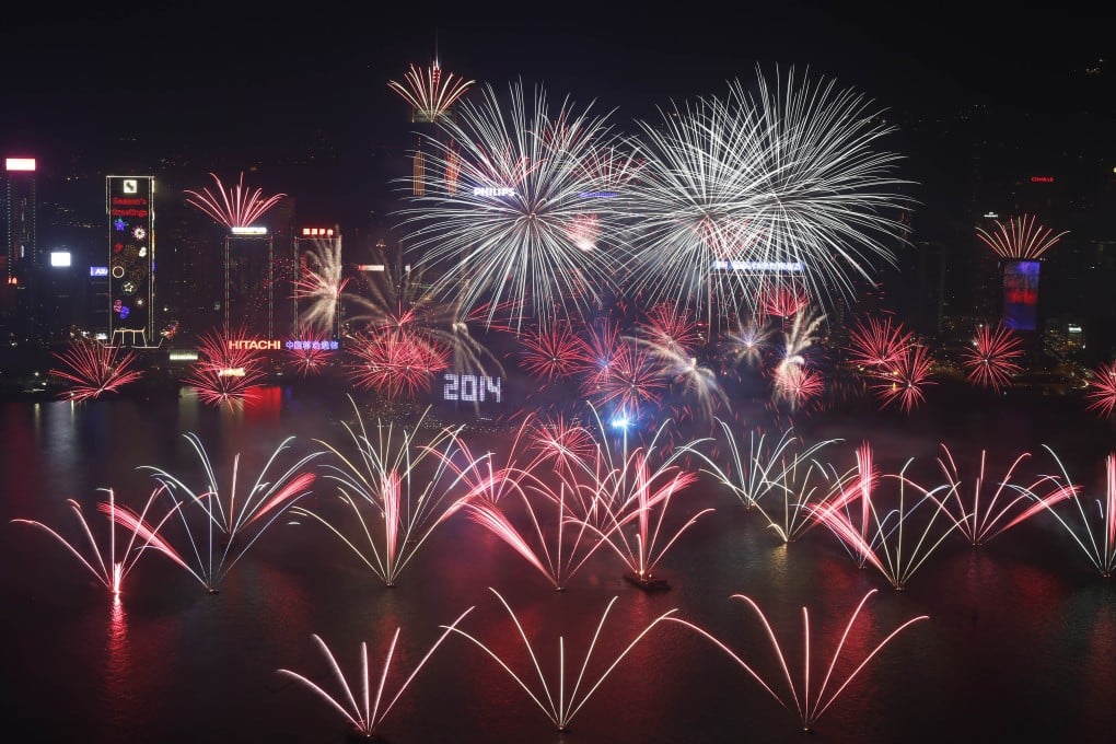 Fireworks explode at the Hong Kong Convention and Exhibition Centre over the Victoria Harbour. Photo: AP