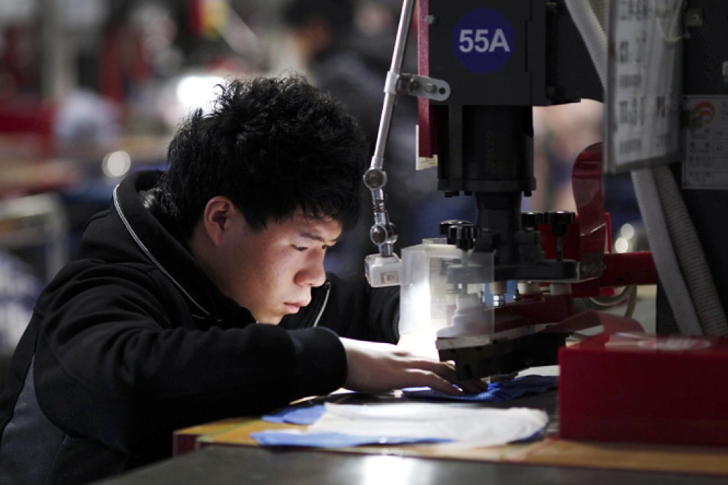 China's urbanisation will require the gradual removal of the residential registration system known as hukou. Photo: Reuters