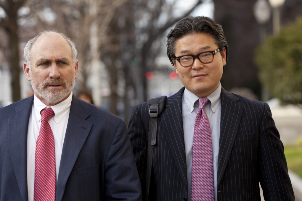 Bill Hwang (right), founder of of Tiger Asia Management LLC, exits federal court with his attorney Lawrence Lustberg New Jersey. Photo: Bloomberg