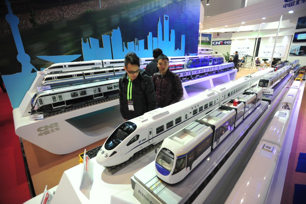 Models of CNR trains at a Beijing exhibition. The company announced 21 billion yuan in orders for trains in October. Photo: Xinhua