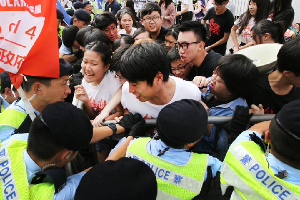 Members of Scholarism clash with police. Photo: Sam Tsang
