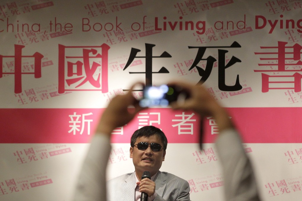 Chinese dissident Chen Guangcheng talks as he attends the book release event for "China, the Book of Living and Dying" in Taipei June 27, 2013. Photo: Reuters