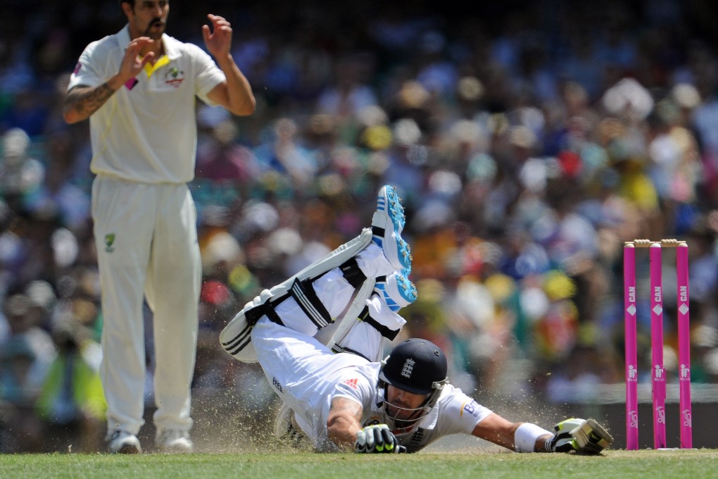 England batsman Kevin Pietersen dives to make his ground on the second day of the fifth Ashes test. Photo: AFP