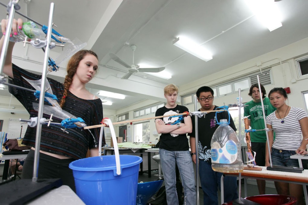 Students of International College Hong Kong make Rube Goldberg machine at the shcool in Sha Tau Kok.