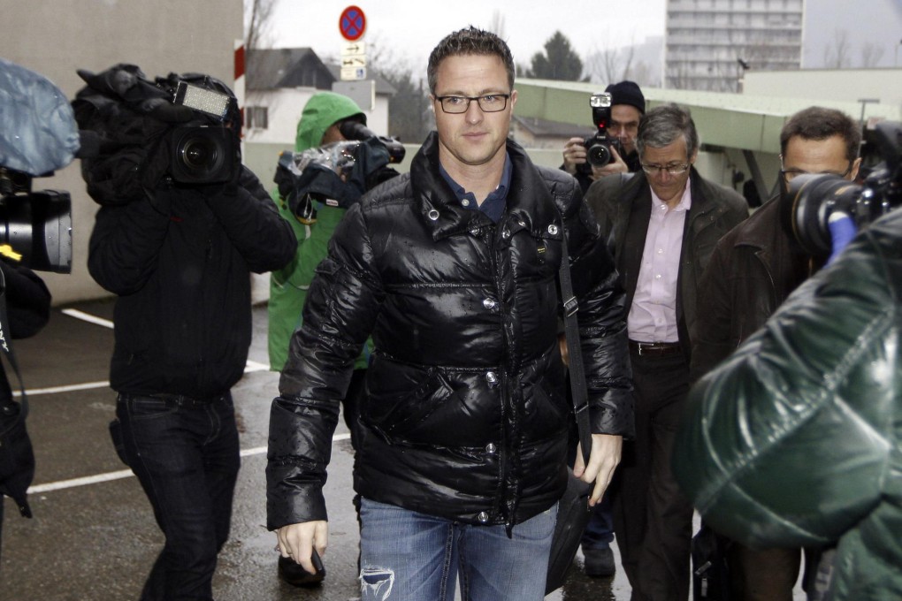 Ralf Schumacher, younger brother of Michael Schumacher and a former F1 driver, arrives at the hospital in Grenoble. Photo: Reuters