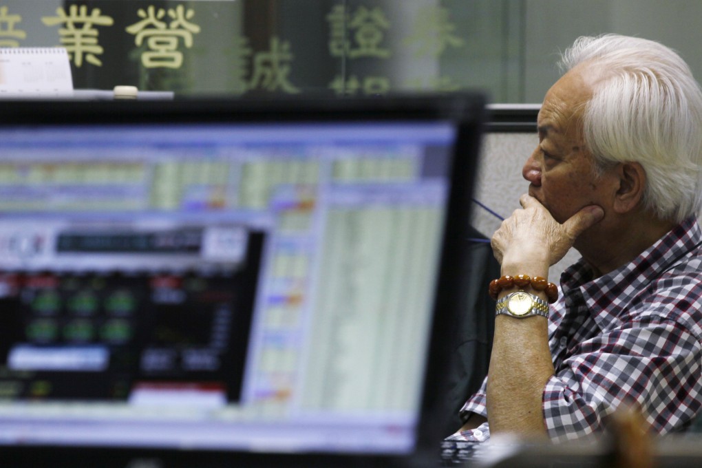 Bocom International expects the share prices of Cheung Kong, Henderson Land Development and Wheelock will rise more than 20 per cent this year. Photo: AP