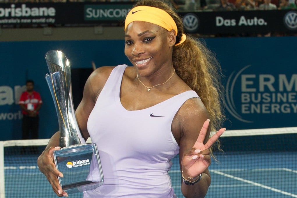 Serena Williams with her trophy after winning the women's singles final against Victoria Azarenka of Belarus at the Brisbane International tennis tournament. Photo: Xinhua
