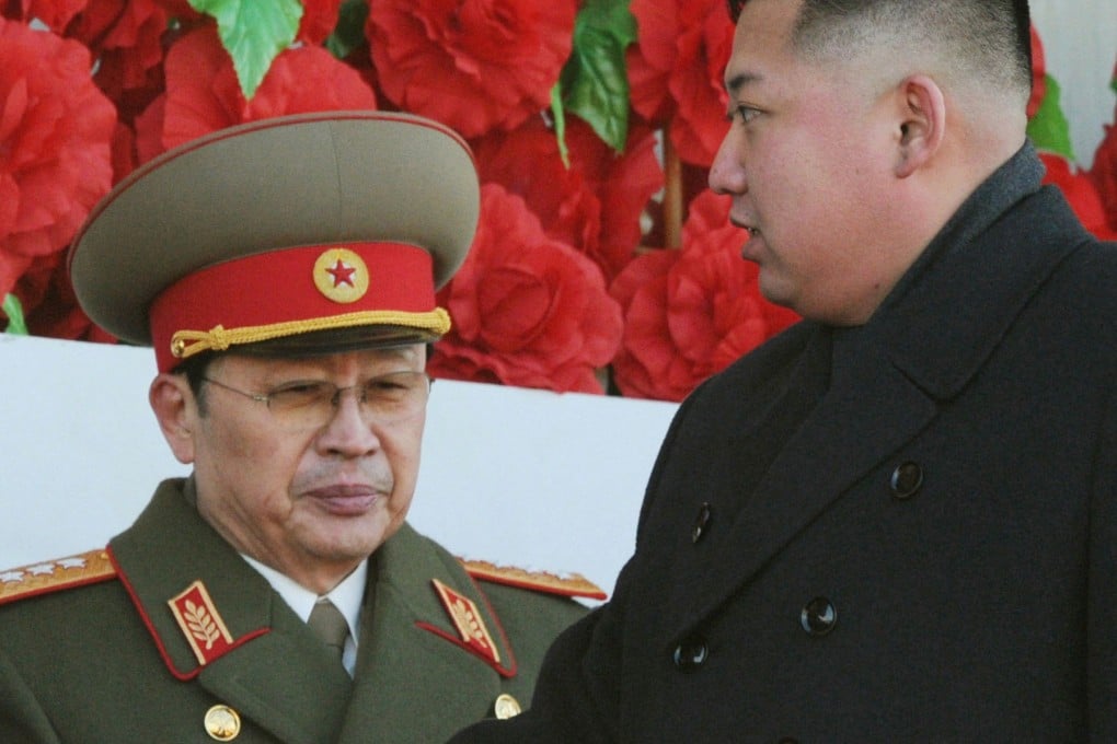 Kim Jong-un (right) and his uncle Jang Song-thaek reportedly warred over control of the country's lucrative coal and seafood exports before Jang was executed for treason. Photo: Reuters