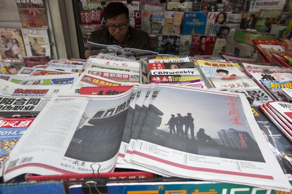 Southern Weekly newspaper copies are left on display at a newsstand in Guangzhou. Photo: Reuters