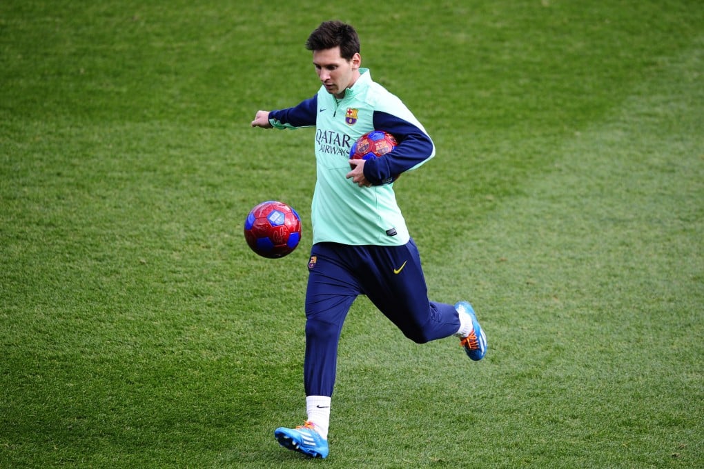 Lionel Messi takes part in a Barcelona training session in preparation for his return to competition. Photo: AP